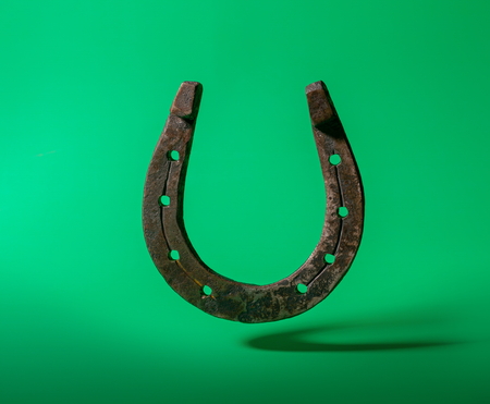 horseshoe green backgroundの写真素材