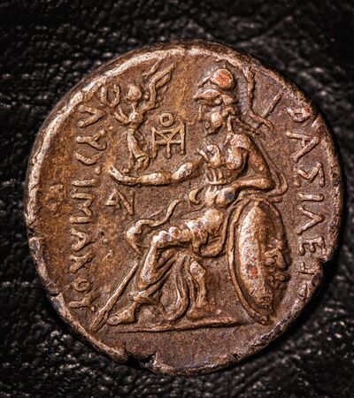 ancient greek coin tetradrachm on a dark backgroundの写真素材