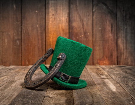 A classic green hat is a fairytale leprechaun hat and a metal horseshoe that brings good luck....