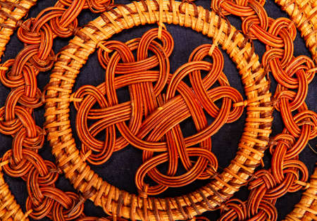 beautiful pattern woven from straw close upの写真素材