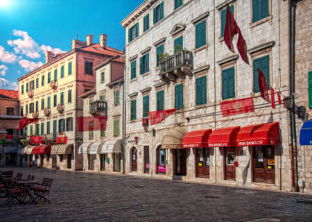 Kotor - Montenegro, 27, July: Street cafes empty from quarantine and empty tables of the tourist town of Kotor in wonderful sunny weatherのeditorial素材