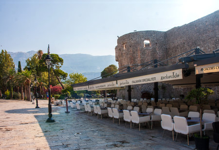 Budva - Montenegro, 1 August: Street cafes empty from quarantine and empty tables of the tourist...