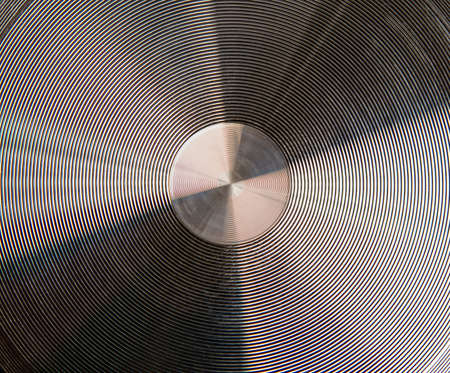 shiny metal plate with concentric annular groovesの写真素材