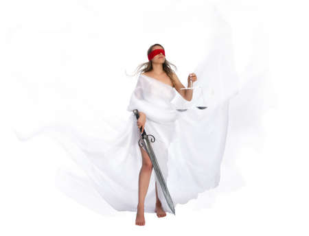 The ancient goddess of justice Themis in fluttering white robes, blindfolded, sword in one hand and scales in the other.の写真素材