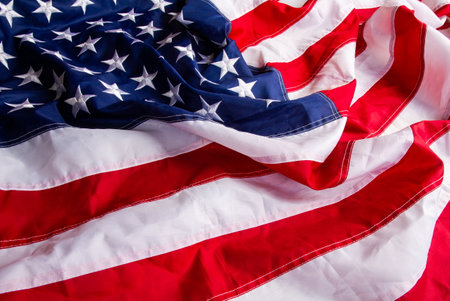 Beautiful star-striped flag waving the state symbol of the United States of America close-upの写真素材