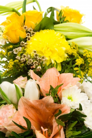 A bouquet of roses lilies amaryllis and chrysanthemumの写真素材