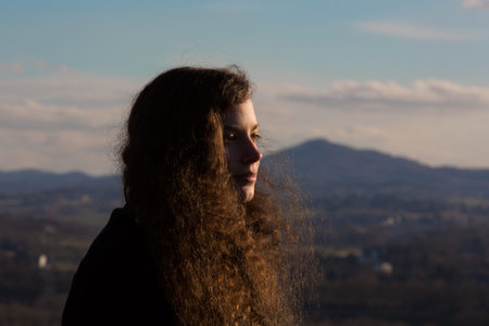 A young pretty woman infront of the Siebengebirge