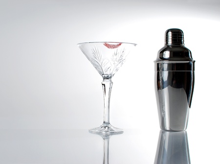Image of martini glass with lipstick and mixerの写真素材