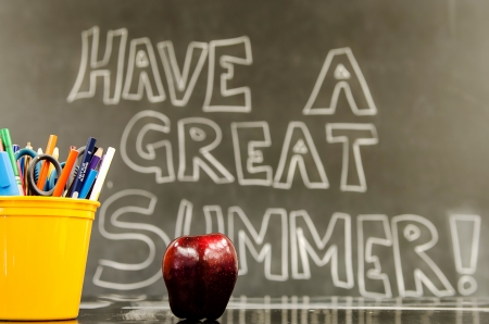 Classroom with  Have a Great Summer  written on the boardの写真素材