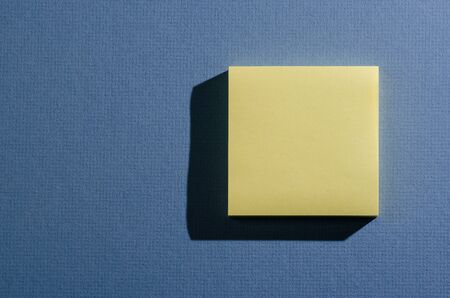 Blank notepad with shadowの写真素材
