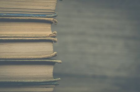 Old books with wood backgroundの写真素材