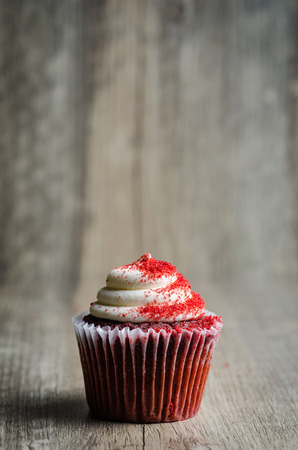 Cupcake on woodの写真素材
