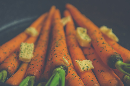 Vintage inspired rustic carrotsの写真素材