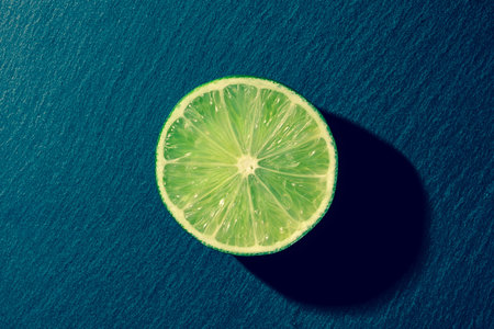 Half of a lime on slate