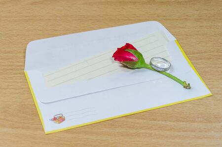 Letters with rose and ringの写真素材