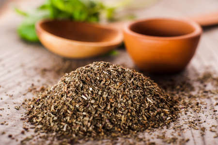 Dried basil on textured tableの写真素材