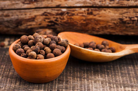Allspice in the ceramic dishの写真素材