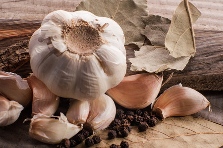 garlic on wooden surfaceの写真素材