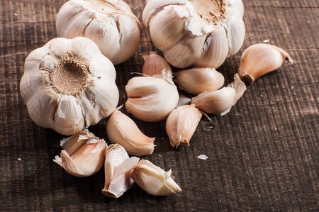 garlic on wooden surfaceの写真素材