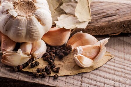 garlic on wooden surfaceの写真素材