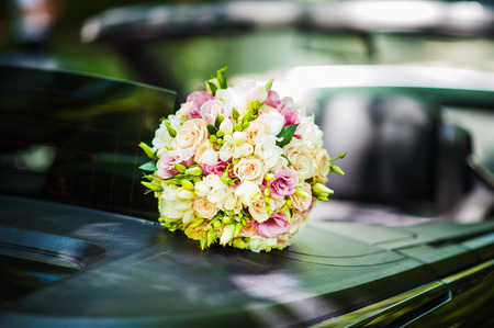 Wedding bouquet on carの写真素材