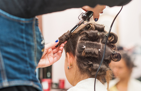 Wrap the hairdresser curling iron, curling ironsの写真素材