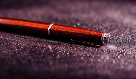 pen on black background.Creative ideas for advertisingの写真素材