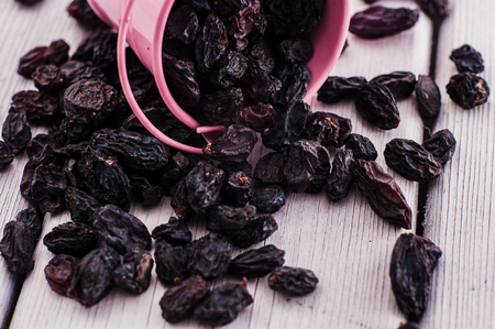 dried fruits healthy living eating.Black raisinsの写真素材