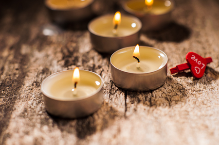 Red candles light with rose.Valentine candle lights.Six, three, two candlesの写真素材