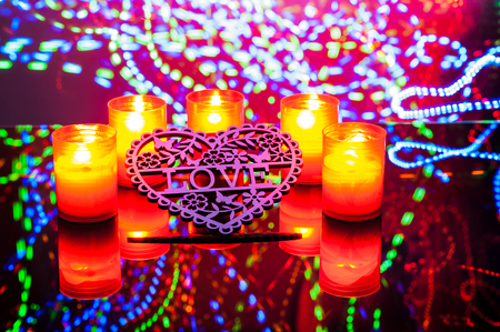 Single lit candles.Candles new year.Beautiful side, background, circles.Valentine candle lights.Valentine's dayの写真素材