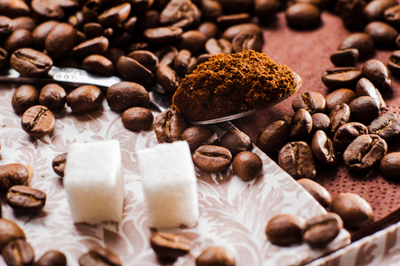 ground coffee.Spoon ground coffee.sugar cubes.coffee beansの写真素材