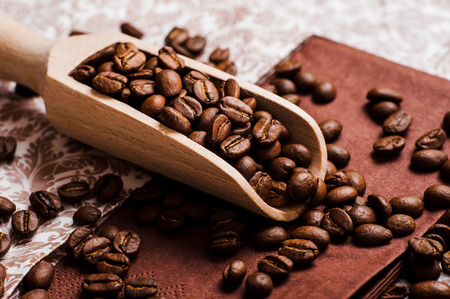 coffee beans.Roasted coffee beans goals.Coffee beans and an old wooden scoopの写真素材