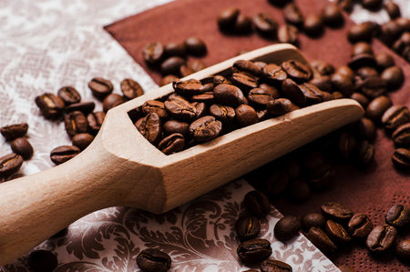 coffee beans.Roasted coffee beans goals.Coffee beans and an old wooden scoopの写真素材