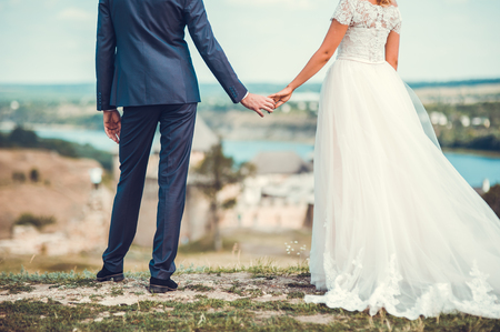 wedding couple.Romantic young couple enjoying sun near river.romance and love by the seaの写真素材
