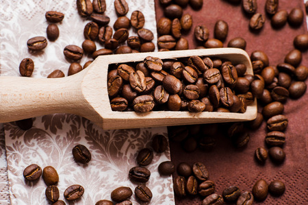 coffee beans.Roasted coffee beans goals.Coffee beans and an old wooden scoopの写真素材