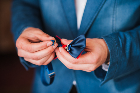    Businessman wearing tie butterfly. work, clothing, punctual, wrist, responsibility,の写真素材