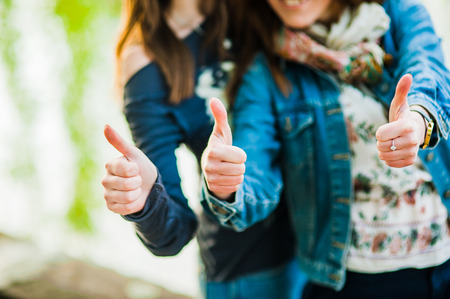 Hands of young people in the nature, team conceptの写真素材