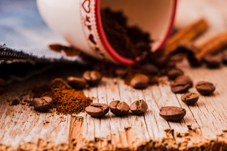 Aromatic coffee beans. Coffee beans in a wooden scoop.Fresh aromatic coffeeの写真素材