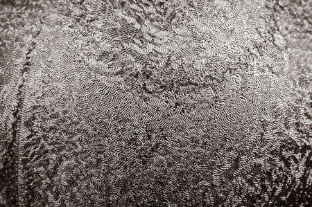 Close up view of the surface of a frozen window. Toned.の写真素材