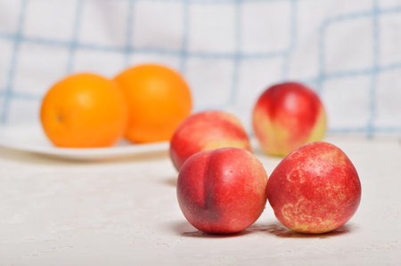 Delicious nectarines on the table. Vitamins are useful.の写真素材