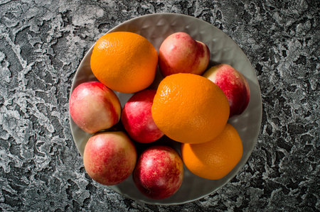 Delicious nectarines on the table. Vitamins are useful.の写真素材