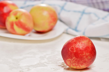 Delicious nectarines on the table. Vitamins are useful.の写真素材