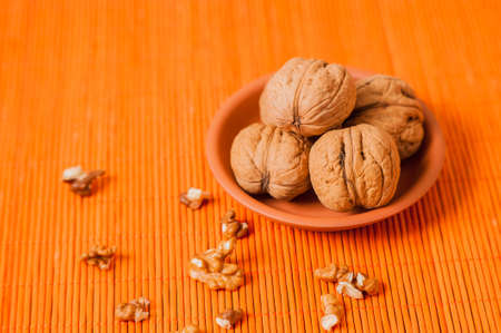 Kernels of walnuts. Walnut kernel in a ceramic bowlの写真素材