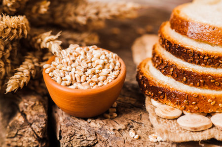 fresh wheat grains and flour.Slices of bread