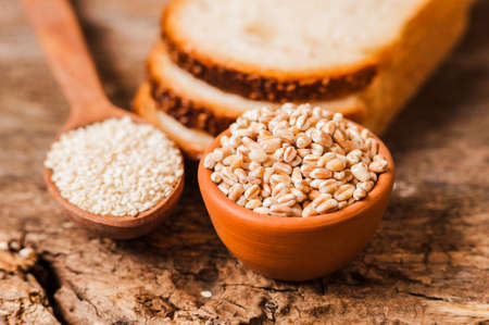 fresh wheat grains and flour.Slices of breadの写真素材