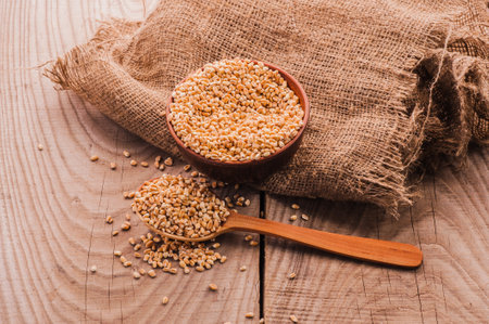 wheat bowl on wooden tableの写真素材
