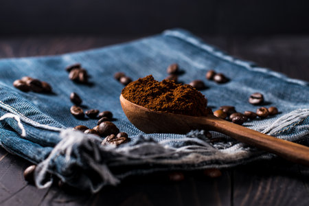 Plate of coffee beans.a bowl of coffee spilled.Very tasty roasted coffee beans. Photo of coffee from above.の写真素材