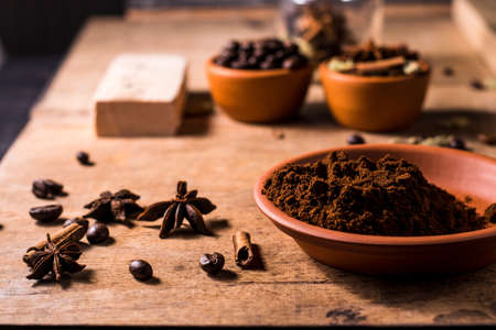 Plate of coffee beans.a bowl of coffee spilled.Very tasty roasted coffee beans. Photo of coffee from above.の写真素材