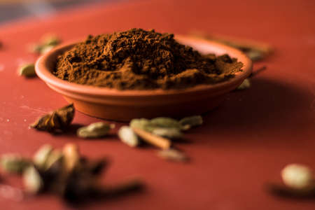 Plate of coffee beans.a bowl of coffee spilled.Very tasty roasted coffee beans. Photo of coffee from above.の写真素材