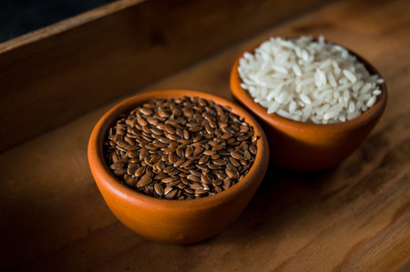 Flax seed spoon on a dark background.